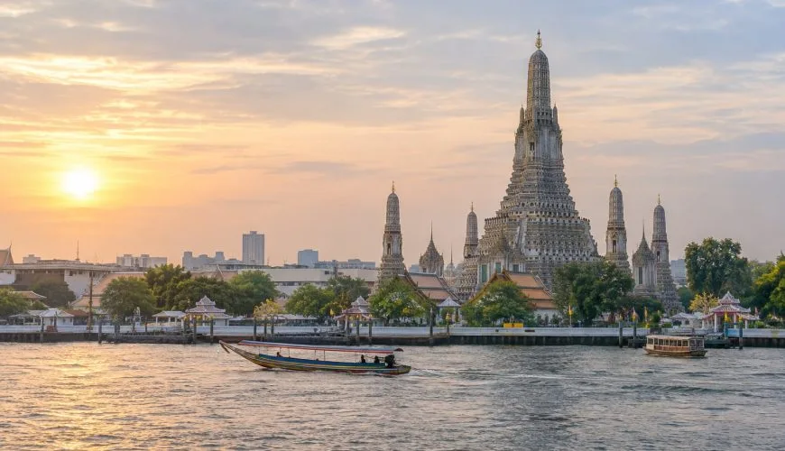 Wat Arun beside the Chao Phraya River in Bangkok