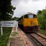 State Railway of Thailand train arriving at Tham Krasae station in Kanchanaburi