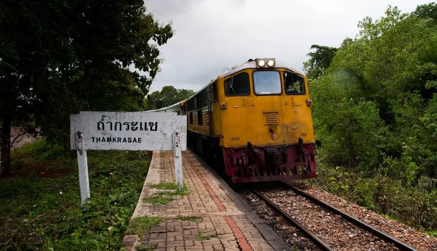 State Railway of Thailand train arriving at Tham Krasae station in Kanchanaburi