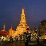 Wat Arun illuminated at night in Bangkok