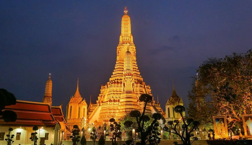 Wat Arun illuminated at night in Bangkok