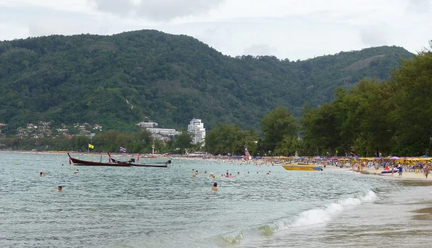 Beach and green hills in Thailand during the summer season